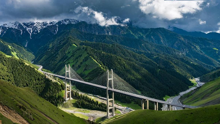 Guozigou Bridge winds among mountains in Xinjiang