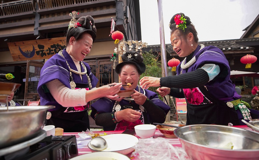 Miao people hold long-table banquet to celebrate traditional New Year in SW China's Guizhou