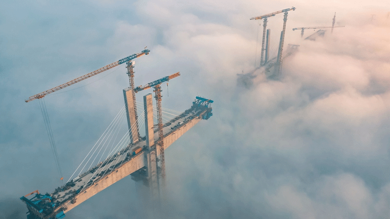 A glimpse into construction of super bridge in the clouds in SW China