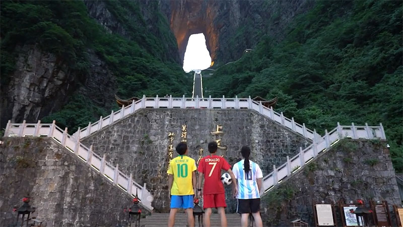 Juggling a football up Tianmen Mountain