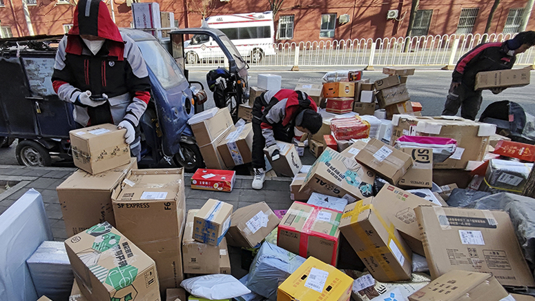 Couriers rush to Beijing to clear delivery backlog