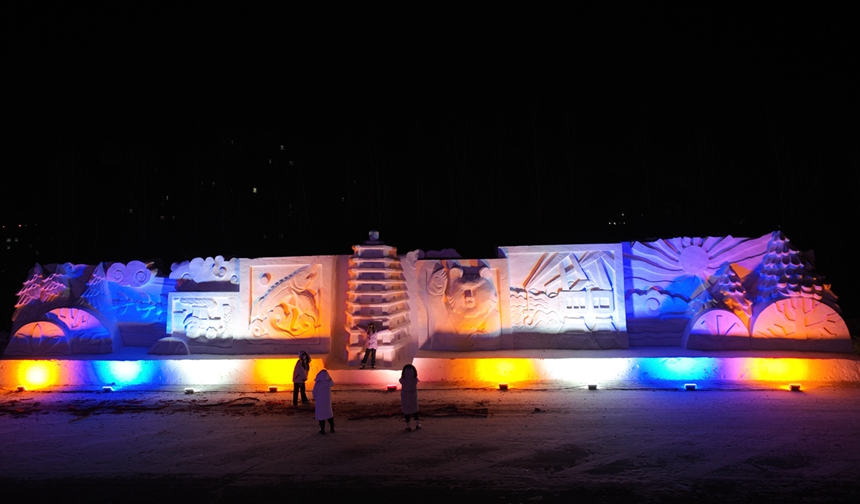 Colorfully lit snow sculptures, busy fish market add festive atmosphere in China's easternmost city