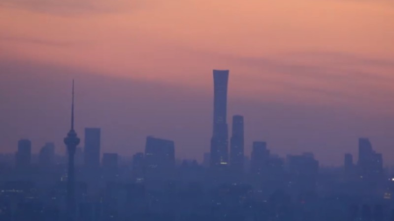 First rays of sunrise over Beijing