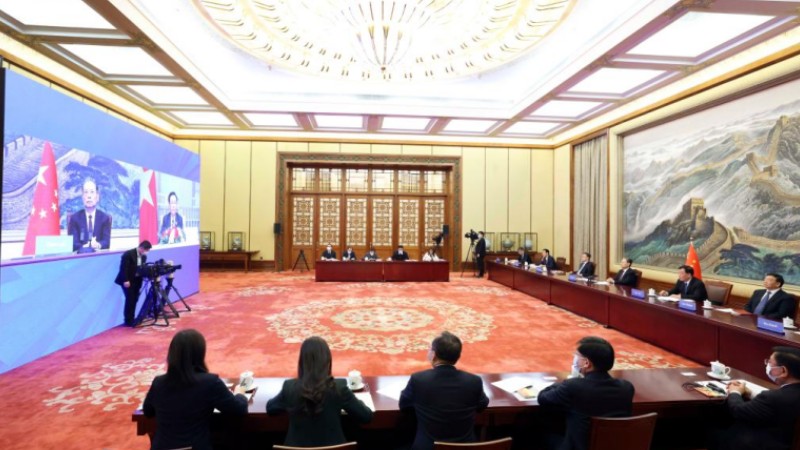 China vows to develop socialist democracy, bilateral ties with Vietnam