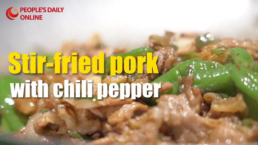 Hunan culinary delight: Stir-fried pork with chili pepper