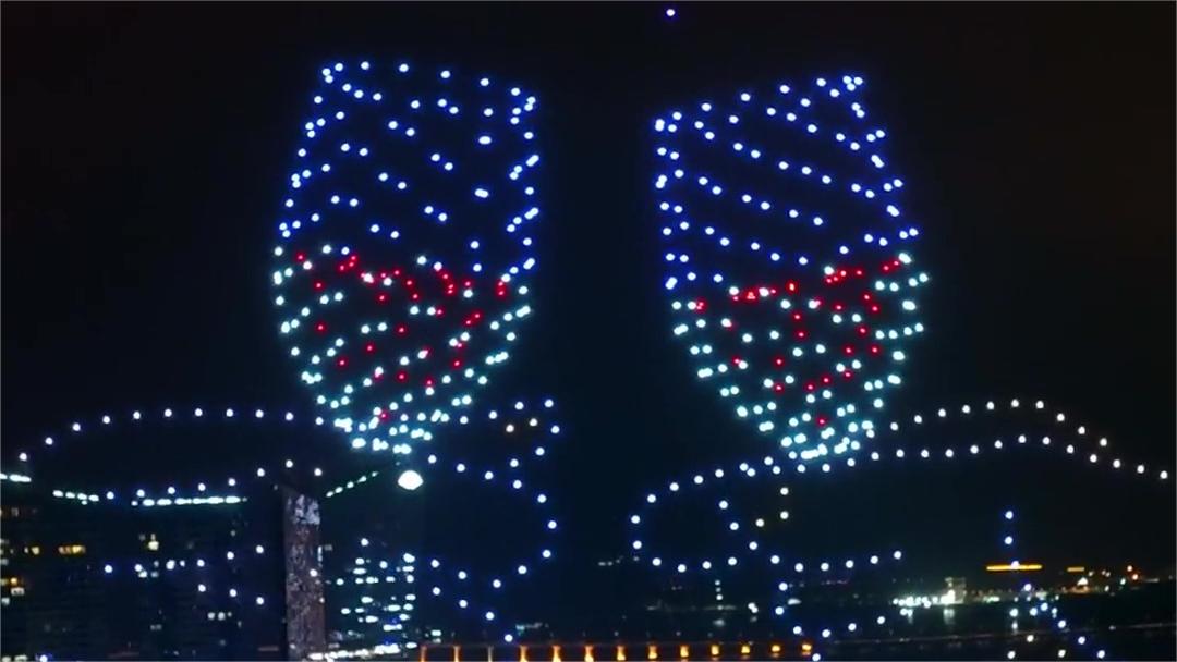 Drones take form of wine glasses toasting