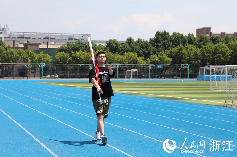 Retired army veteran takes charge of flag raising for Hangzhou Asian Games