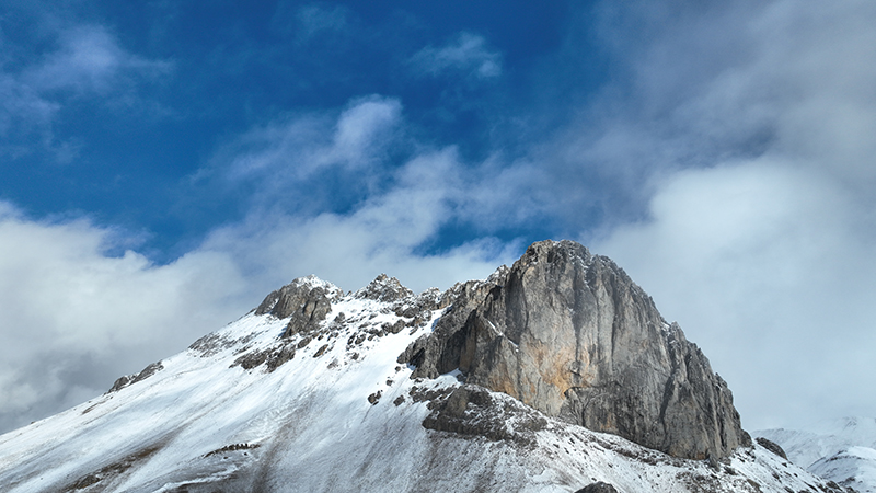 Spectacular views emerge after snowfall at Baima Snow Mountain