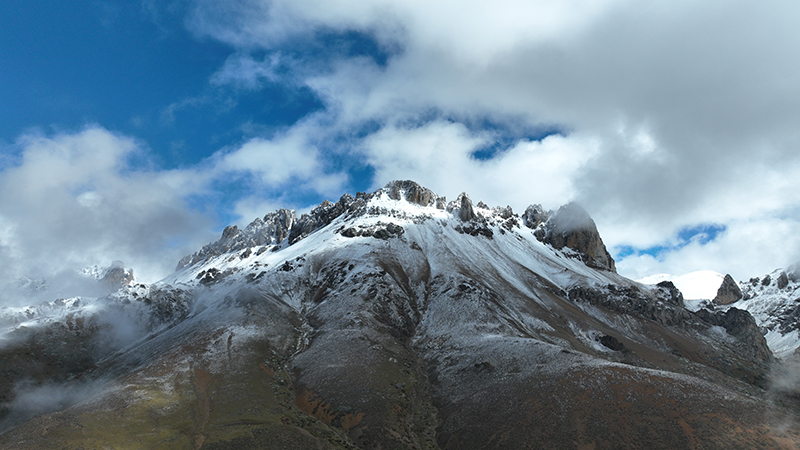 Spectacular views emerge after snowfall at Baima Snow Mountain