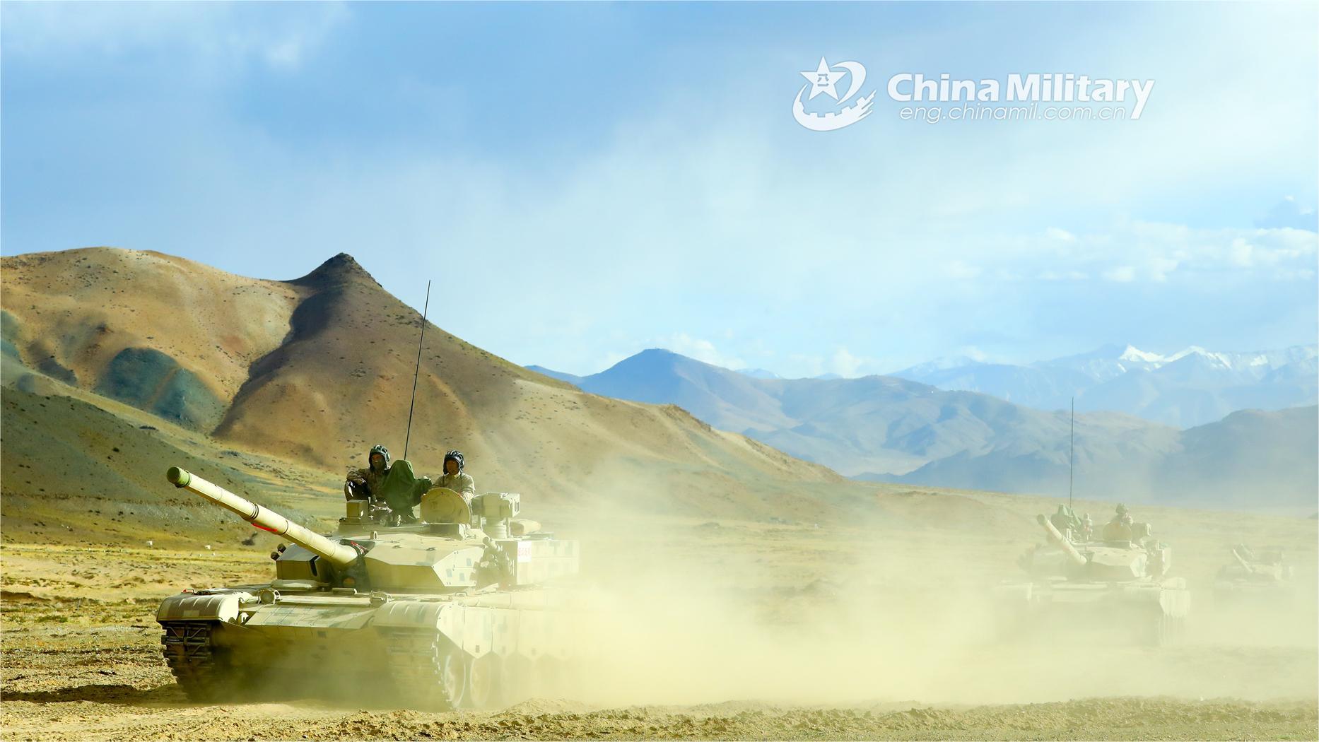 Tanks maneuver during tactical training