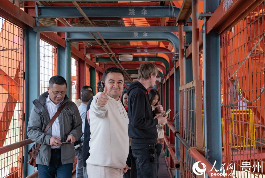 In pics: Eurasian journalists captivated by Balinghe bridge in SW China's Guizhou