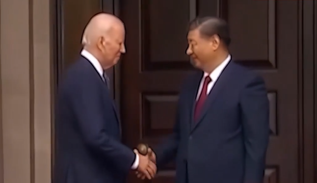 Xi shakes hands with Biden ahead of meeting