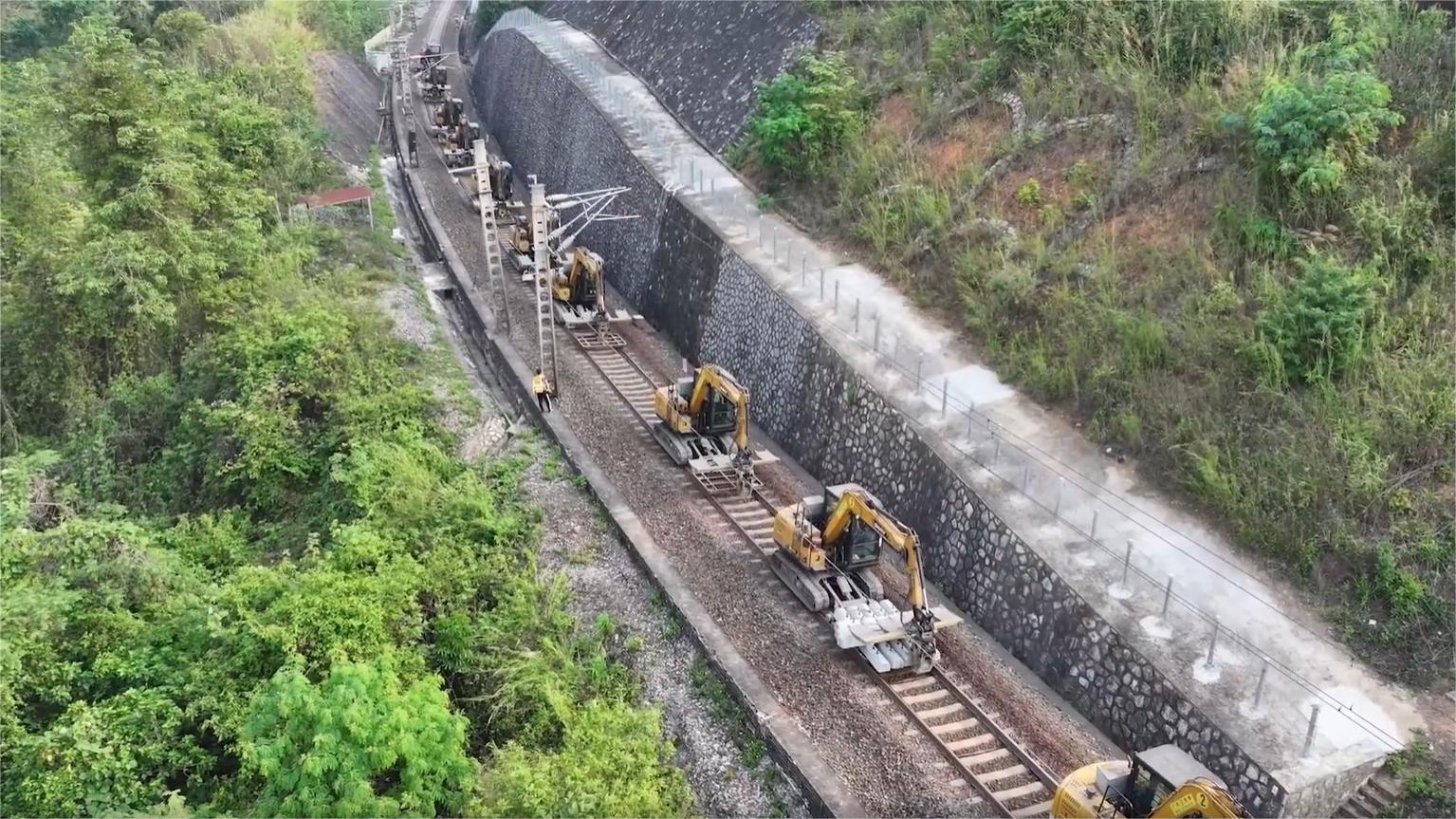 Bulldozers fix up rail tracks before Spring Festival travel rush