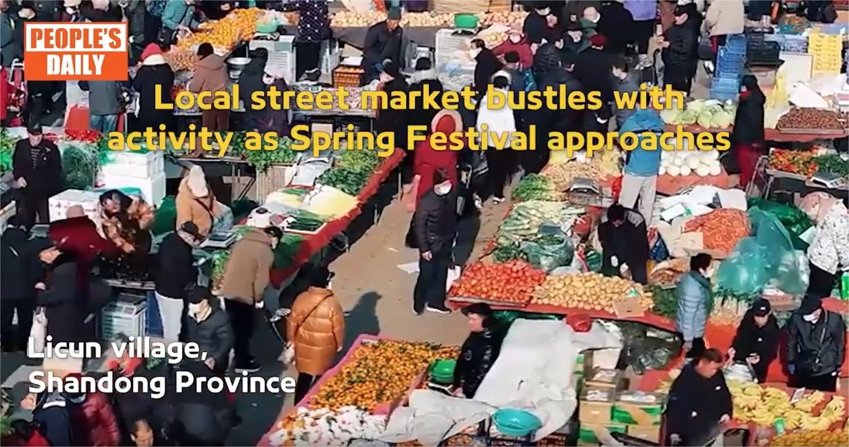 Local street market bustles with activity as Spring Festival approaches