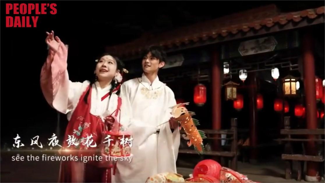 Students sing during traditional Chinese Lantern Festival in multiple languages
