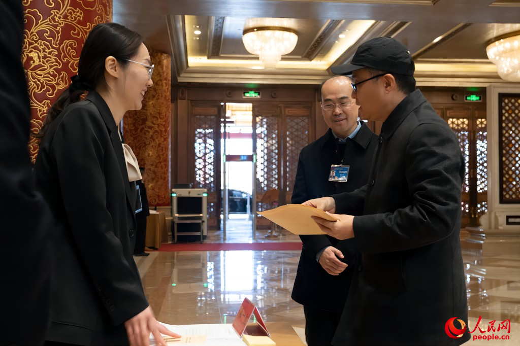 Chinese national lawmakers register for annual session in Beijing