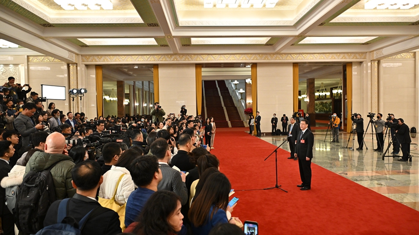 Ministers interviewed after opening meeting of second session of 14th NPC