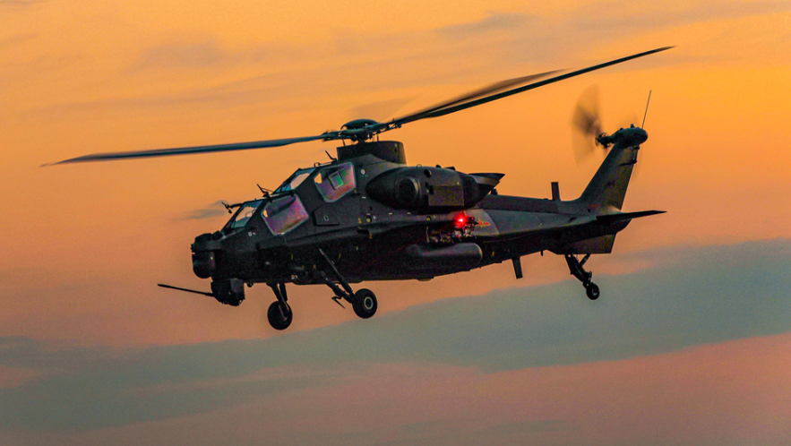 Attack helicopter lifts off for flight training