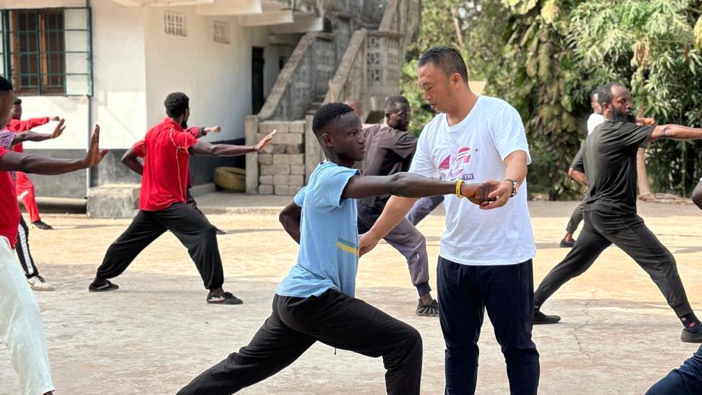 Chinese kung fu teacher's classes draw hundreds in Sierra Leone