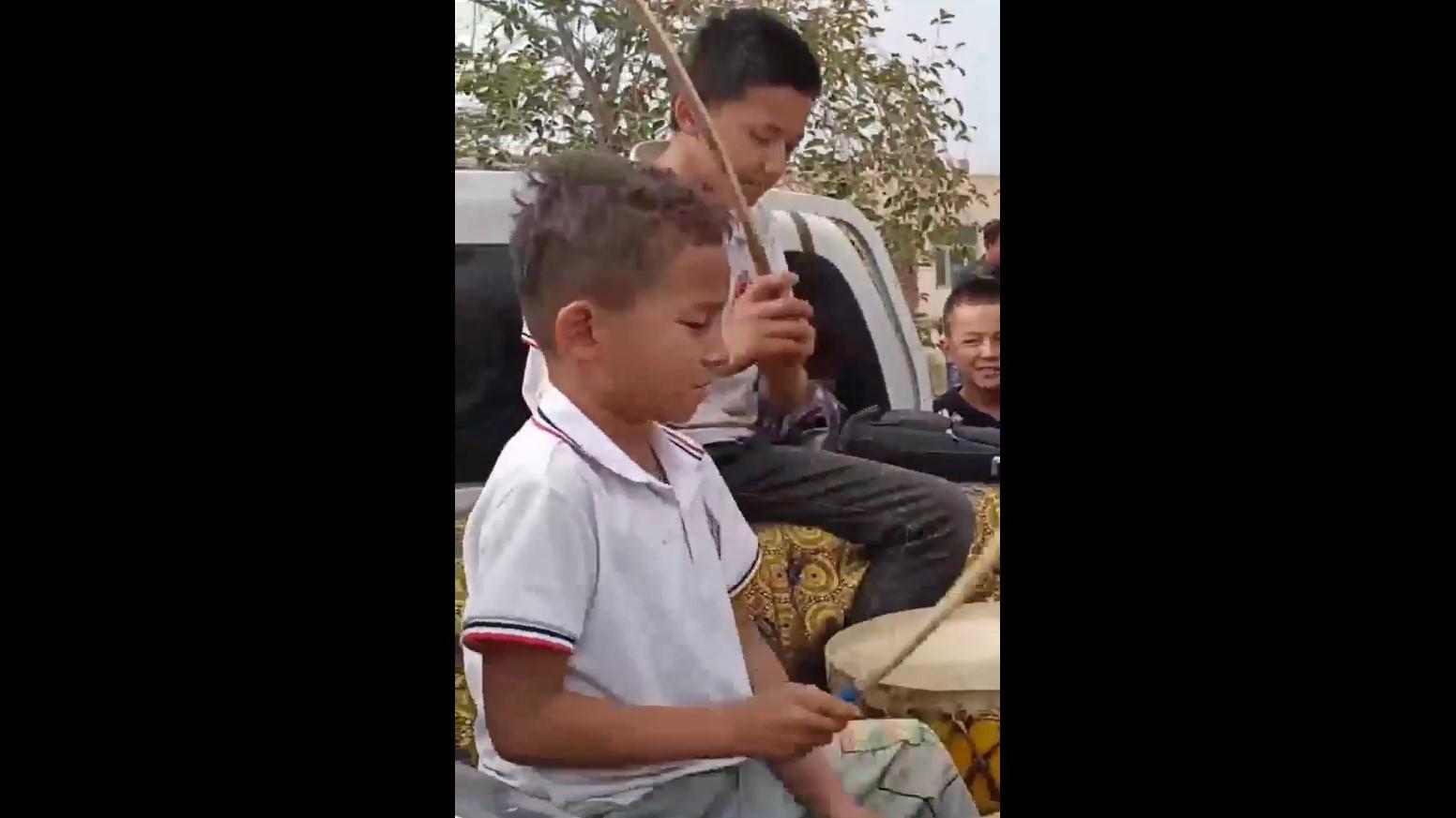 Young drummers bring the beat to Xinjiang wedding