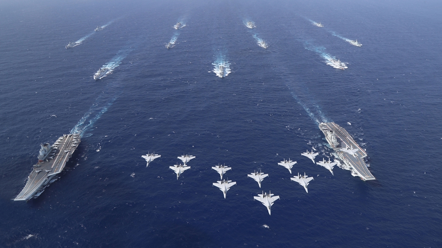 Chinese navy conducts dual aircraft carrier formation exercise for first time