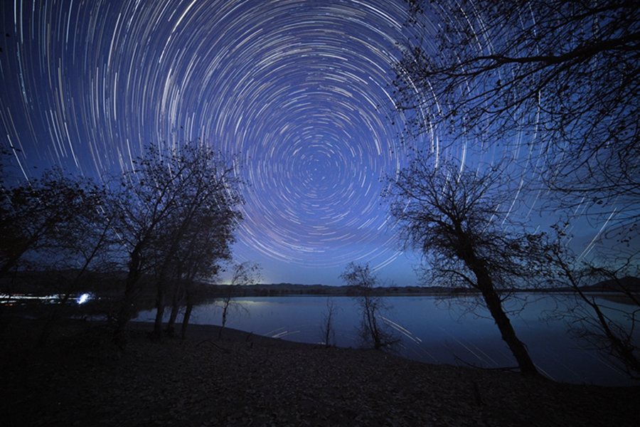 Brilliant starry sky over Luobu Lake in NW China's Xinjiang