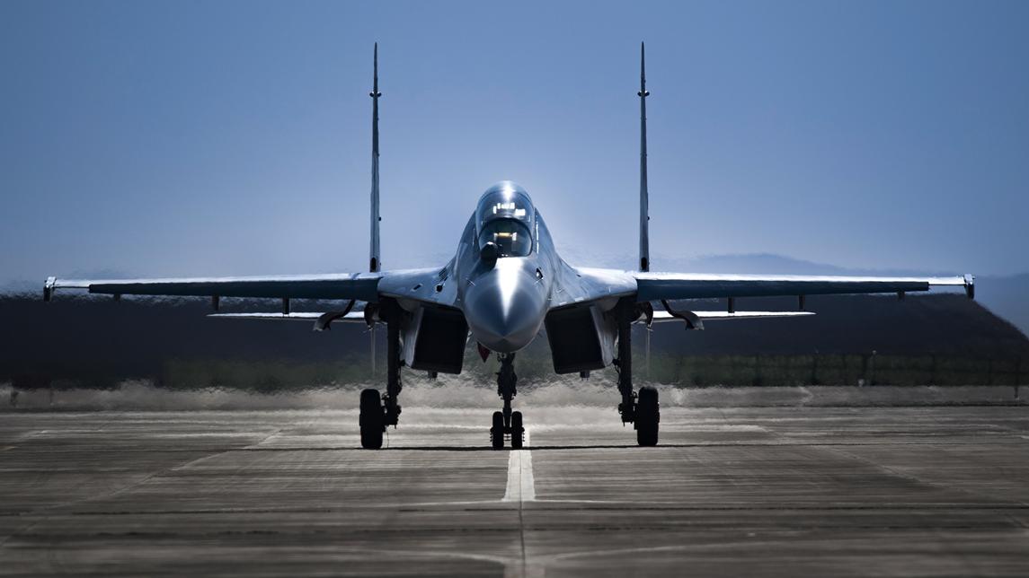 J-16 multi-role fighter jet taxis on flightline