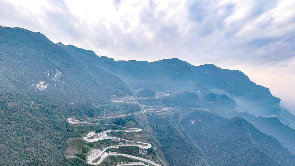 A road to prosperity built along cliff faces in SW China's Sichuan