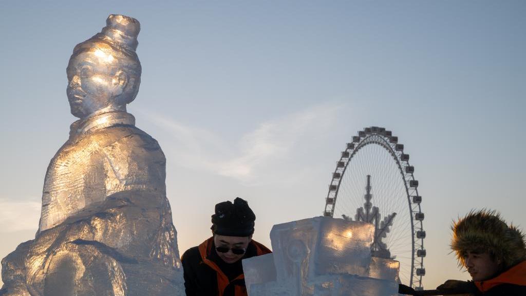 Ice dragon sculpture wows visitors in NE China