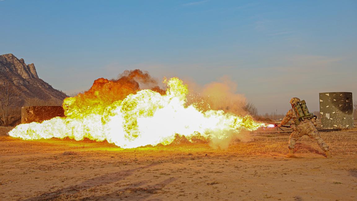 Soldiers Shoot with Flamethrower