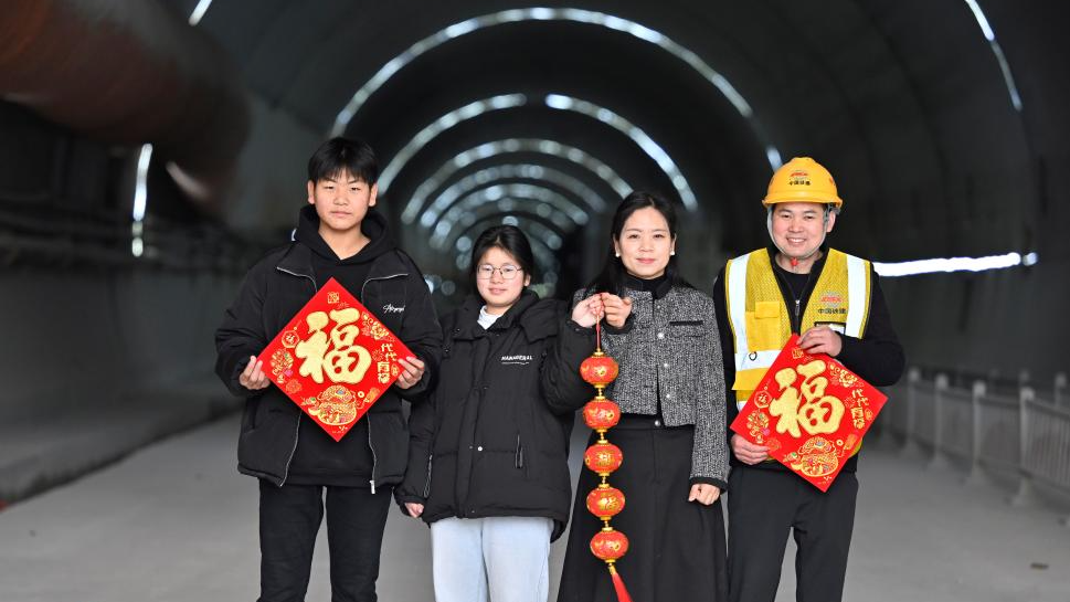 Workers reunite with families at construction site in Liuzhou, China's Guangxi