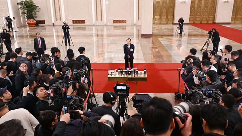 Ministers give interviews after NPC opening meeting