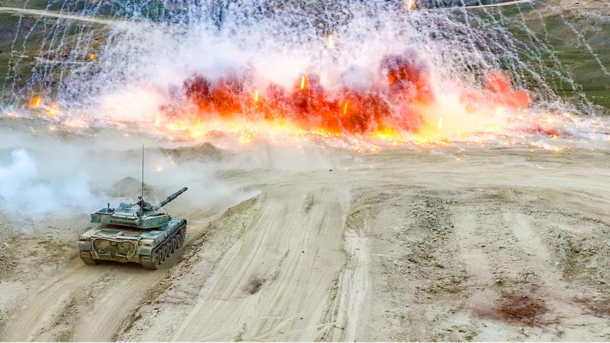 MBT fires smoke bombs