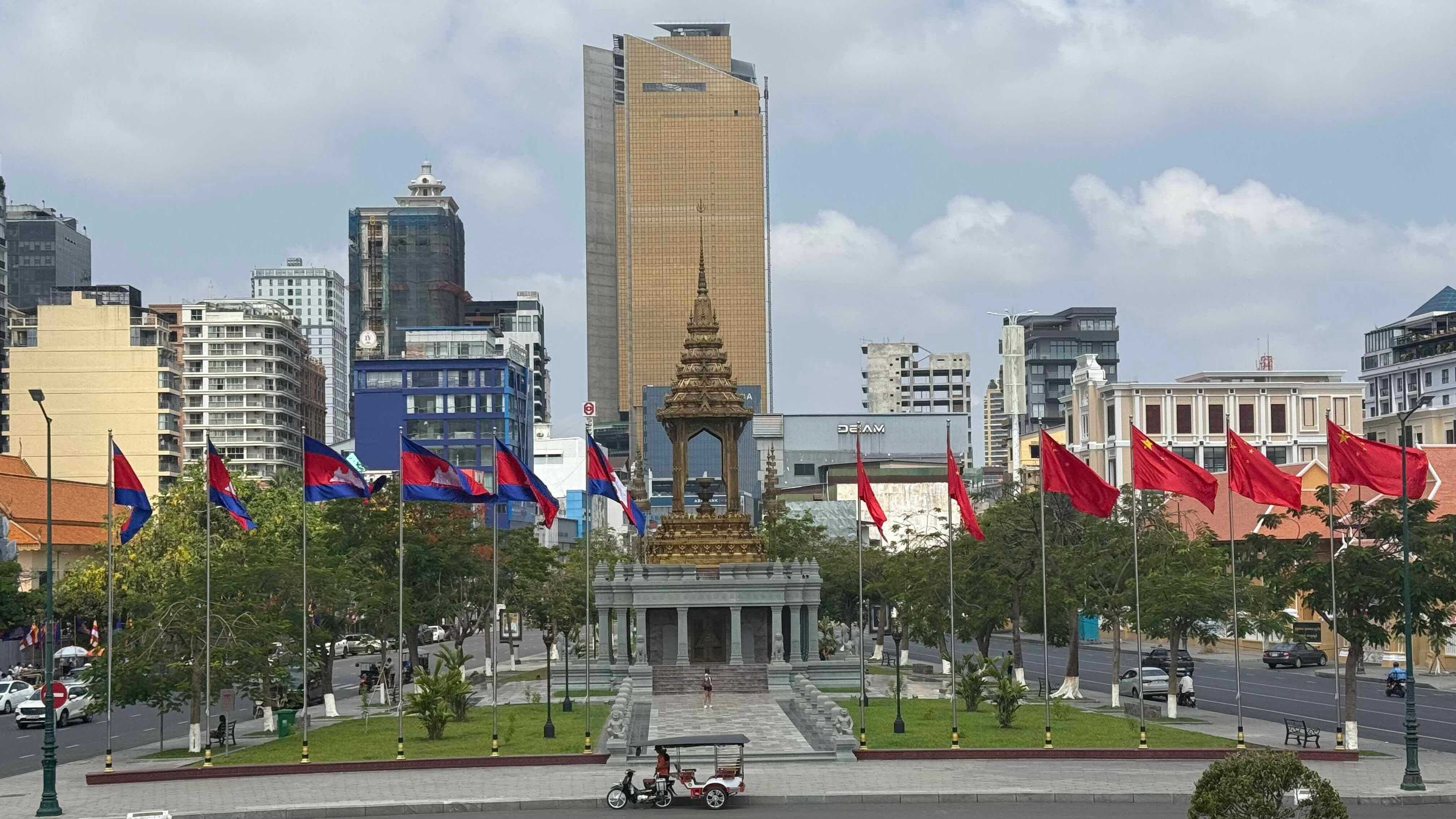 Chinese and Cambodian national flags fly in Phnom Penh, Cambodia