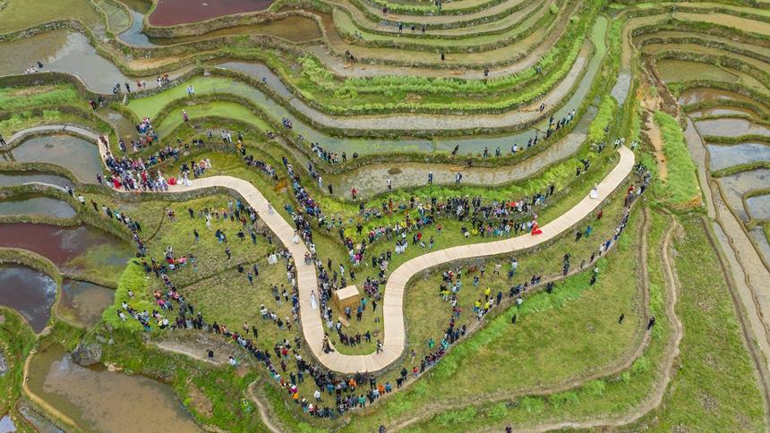 Fashion catwalk set against terraced fields in SW China's Guizhou