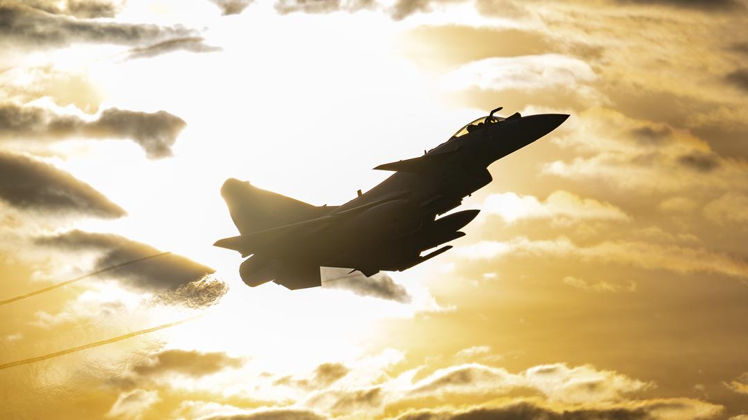 Fighter jets take off at twilight