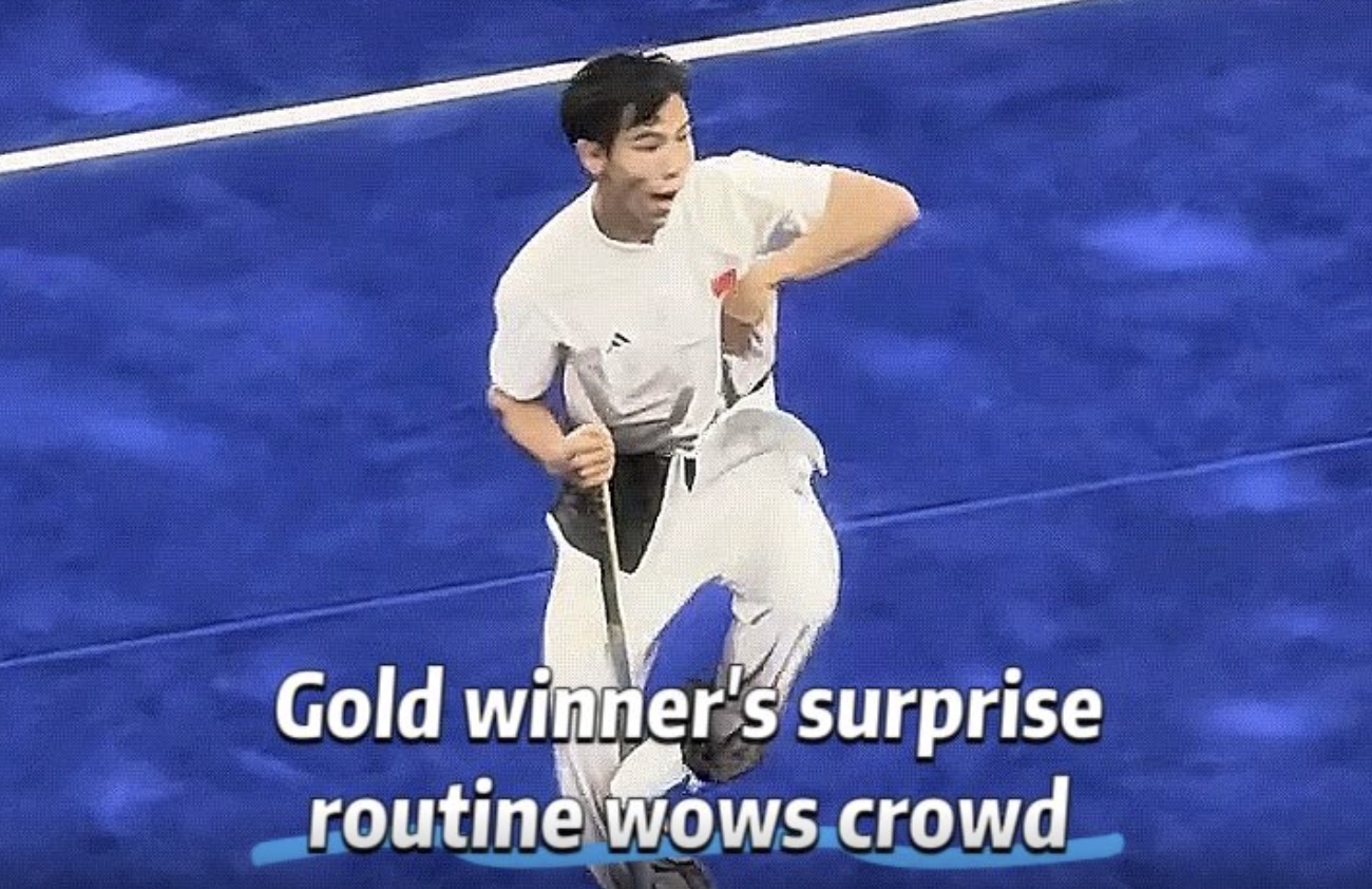 Gold winner's surprise routine wows crowd