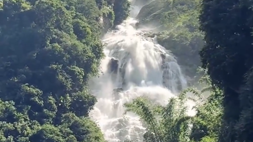 Waterfall roars down Yunnan mountain valley