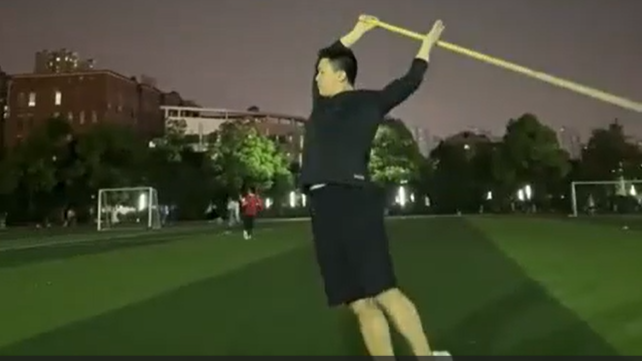 Staff gymnastics performed by a Chinese martial artist