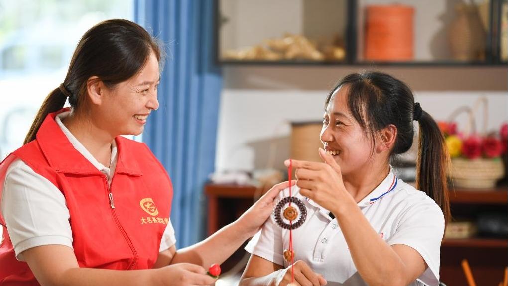 Millennia-old craft weaves hope, opportunity for people with disabilities in north China