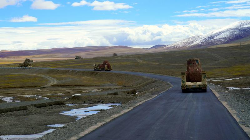 TA4360 heavy equipment transport vehicles wade through water area