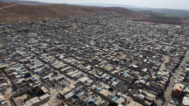 One year after Syria's war ends, displaced families return to ruins, not homes