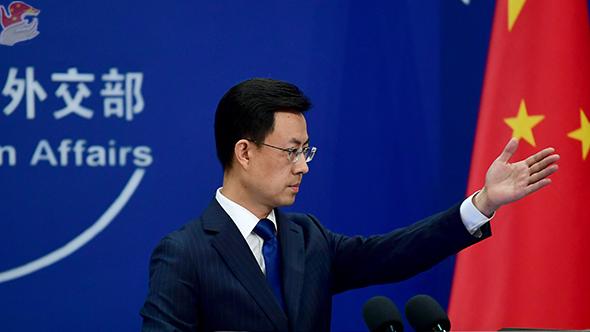 China warns Japan against reviving militarism