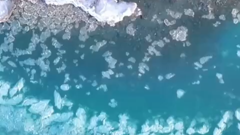 Ice floes glitter on Tekes River