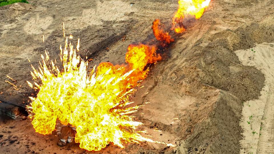 Army soldiers shoot with flamethrowers