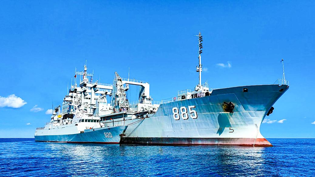Warships conduct replenishment at sea