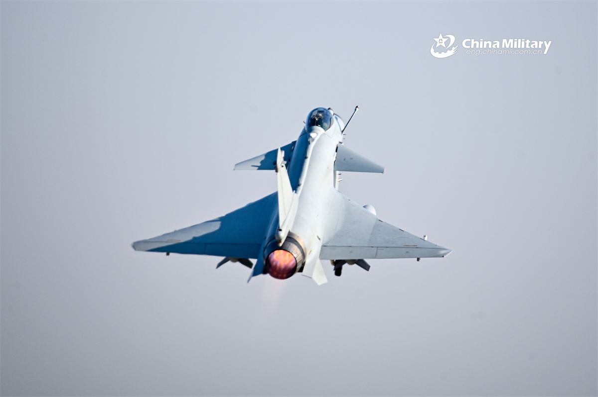 A J-10 fighter jet attached to a unit with the air force under the Chinese PLA Eastern Theater Command soars into the sky during a flight training exercise on January 5, 2026. (eng.chinamil.com.cn/Photo by Wang Zixiao)