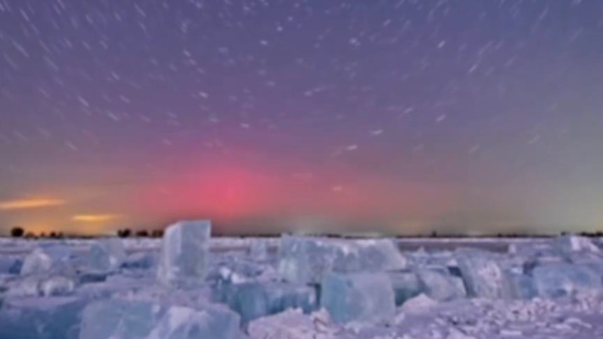Aurora lights dance across the starry sky in Northeast China