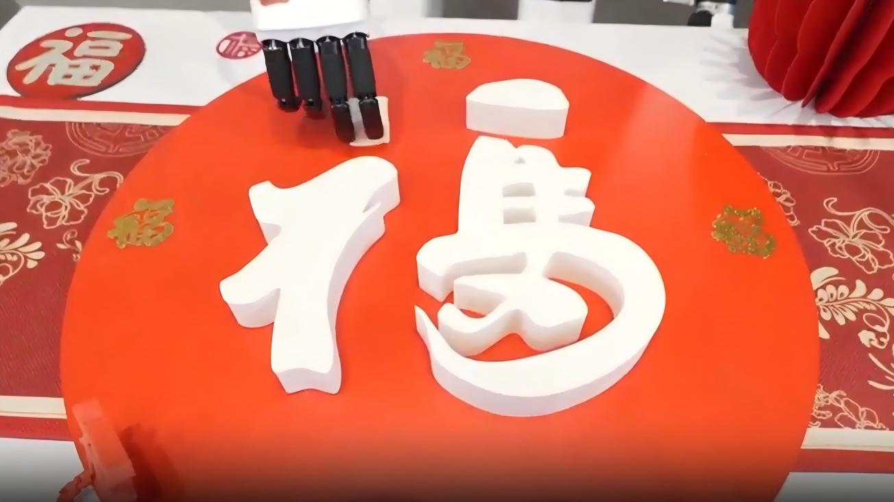 Humanoid robot gently picks up tofu in precision test