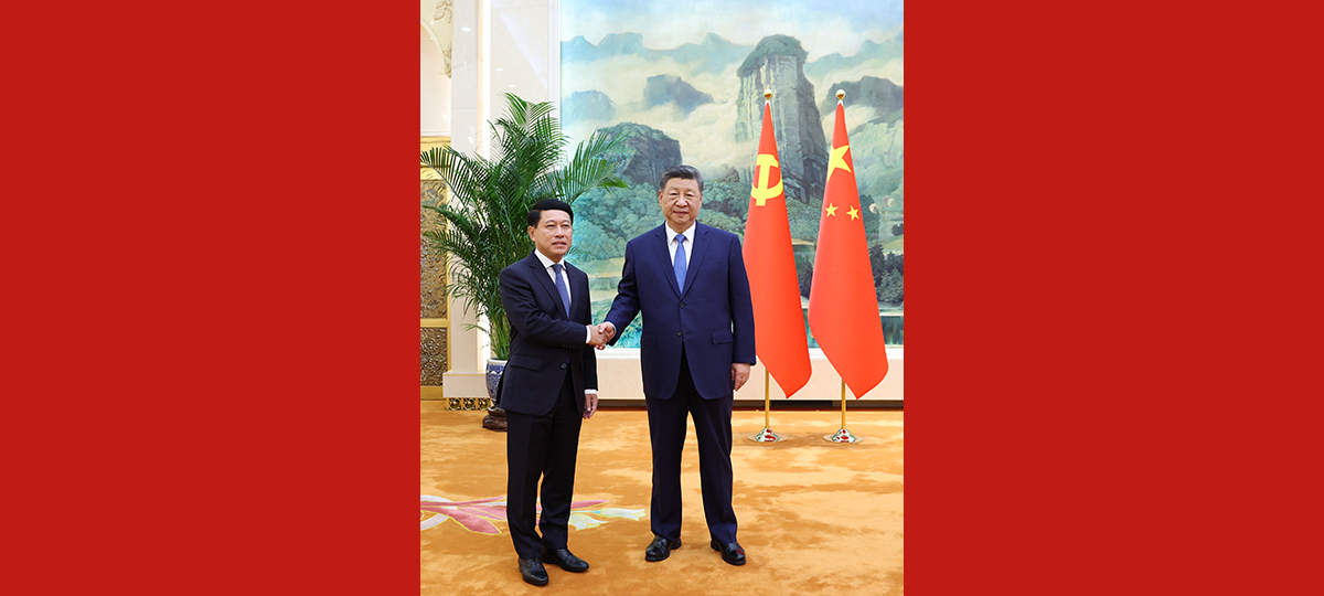 Xi meets special envoy of Lao leader Thongloun